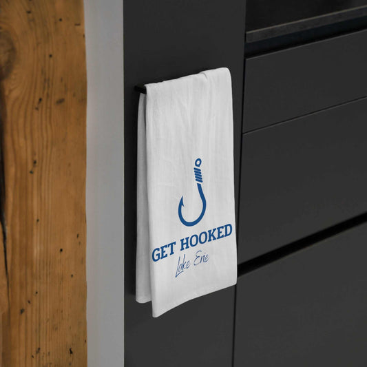 Hooked-Lake Erie tea towel hanging in kitchen, 100% cotton.